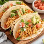Slow Cooker Queso Chicken Tacos