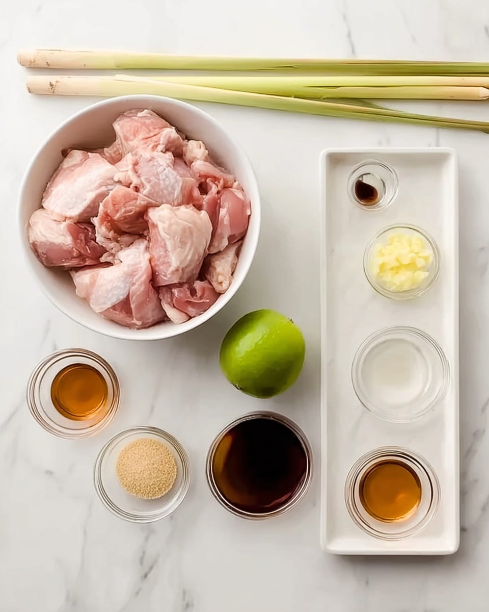 The image shows a white bowl on the left filled with raw pink chicken pieces. Next to the bowl, there is a white rectangular tray holding various ingredients: a whole green lime in the center, a small glass cup with light yellow minced garlic, a small brown cup filled with light brown sugar, and four small glass cups with different liquids in shades of clear white, amber brown, and dark brown. On top of the white marbled surface are two long pale green stalks of lemongrass placed horizontally. The entire setup is arranged neatly on a white marbled background. photo taken with an iphone --ar 4:5 --v 7