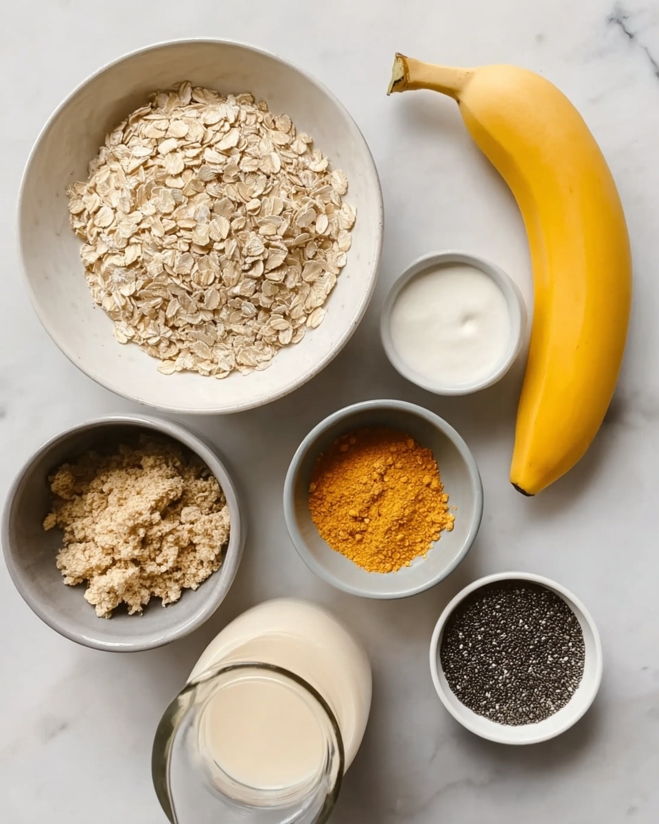 The image shows several white bowls and one gray bowl arranged on a white marbled surface. In the large white bowl at the center, there is a layer of dry oats with a rough texture and pale beige color. To its right, a bright yellow banana sits on the surface. Above the oats, a small white bowl contains a smooth white creamy substance. Next to it, another small white bowl holds light orange powder flakes. Below the oats, a medium gray bowl is filled with a crumbly, light brown mixture. To its right, a clear glass jug is half-filled with light beige milk. Below the jug, there is a small white bowl filled with black chia seeds, and next to it, a small white bowl contains a very dark liquid with a shiny surface. The scene is well-lit and clean. Photo taken with an iphone --ar 4:5 --v 7