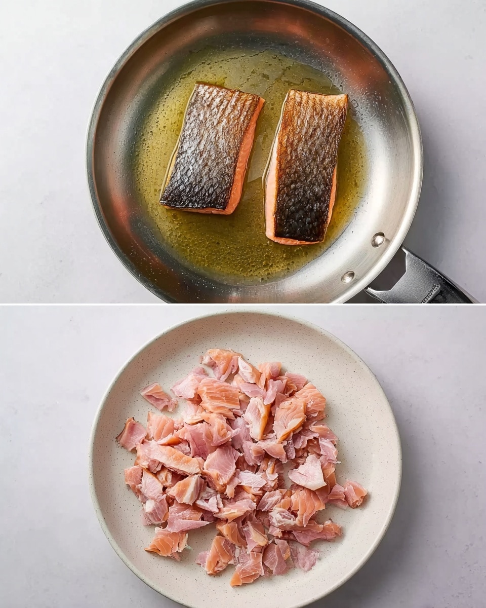 The image shows two parts: the top part has a silver pan with two pieces of fish frying, each piece showing a crispy dark brown skin on one side and soft pink flesh on the other, sitting in shiny oil inside the pan. The bottom part shows a round white plate filled with small flaky pieces of cooked pink fish, spread evenly across the plate on a white marbled surface. photo taken with an iphone --ar 4:5 --v 7