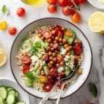Cherry Tomato Couscous Salad with Roasted and Fresh Tomatoes, Feta, and Chickpeas Recipe