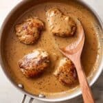 Southern Smothered Chicken Thighs with Gravy and Rice Recipe