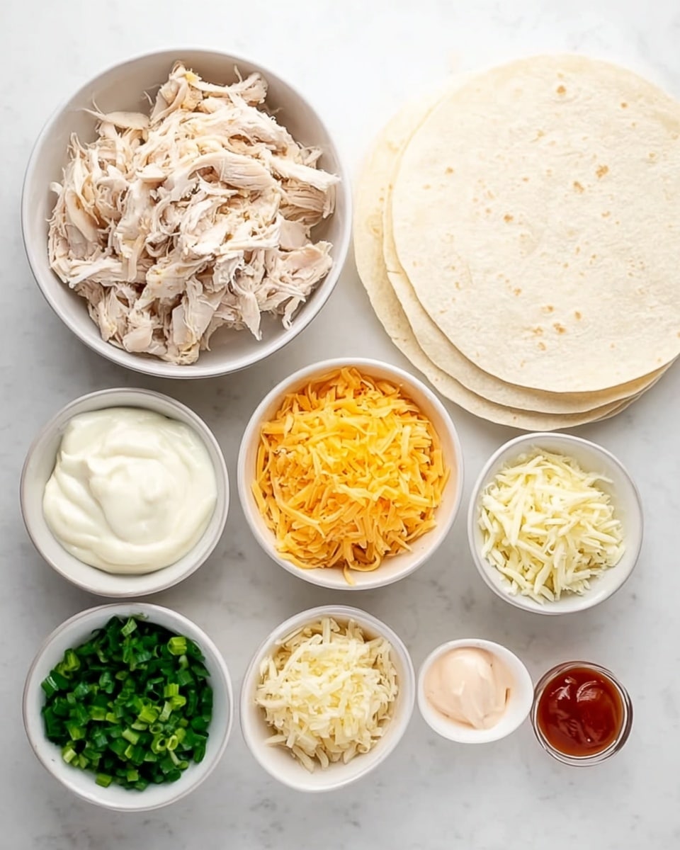 The image shows a top view of several white bowls arranged on a white marbled surface, each holding different ingredients for a dish. One bowl contains shredded cooked chicken with a white and light brown color, positioned near the center top. Next to it, smaller white bowls hold creamy white sour cream, golden-yellow shredded cheddar cheese, finely chopped green onions, pale yellow shredded cheese, light pink mayonnaise, minced garlic, and a small amount of red hot sauce. On the right side, three white flour tortillas are placed stacked and partially overlapping. The arrangement is neat and bright, suggesting preparation for assembling a wrap or taco dish. Photo taken with an iphone --ar 4:5 --v 7