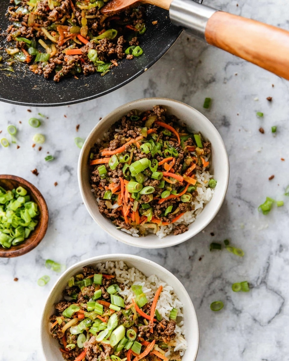 Two white bowls filled with three layers each: a bottom layer of white rice, a middle layer of mixed ground meat and thin strips of orange carrots and light brown vegetables, and a top layer of chopped green onions scattered all over. One bowl is held by a woman's hand and a black pan with a wooden handle is tilted above it, with some food falling from the pan into the bowl. Nearby, there is a small round wooden bowl filled with more chopped green onions, all placed on a white marbled surface. Small bits of green onions and food pieces are scattered around. photo taken with an iphone --ar 4:5 --v 7