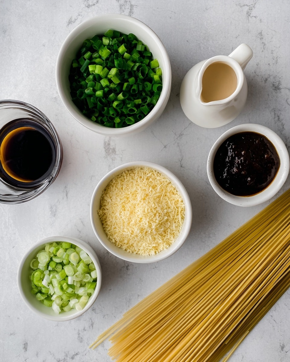 The image shows a top view of several ingredients on a white marbled surface. On the top left, there is a white bowl filled with dark green chopped scallions. To the right, a small white pitcher holds a light beige liquid. Below the pitcher and bowl, in the center, is a white bowl filled with finely grated light yellow garlic. On the left of the garlic bowl, there's a transparent glass with a dark brown liquid inside. To the right of the garlic bowl, a small white bowl contains a thick dark brown sauce. At the bottom left, another white bowl is filled with pale green chopped scallions. On the bottom right, a bunch of dry uncooked spaghetti noodles lies spread out flat on the white marbled surface. photo taken with an iphone --ar 4:5 --v 7